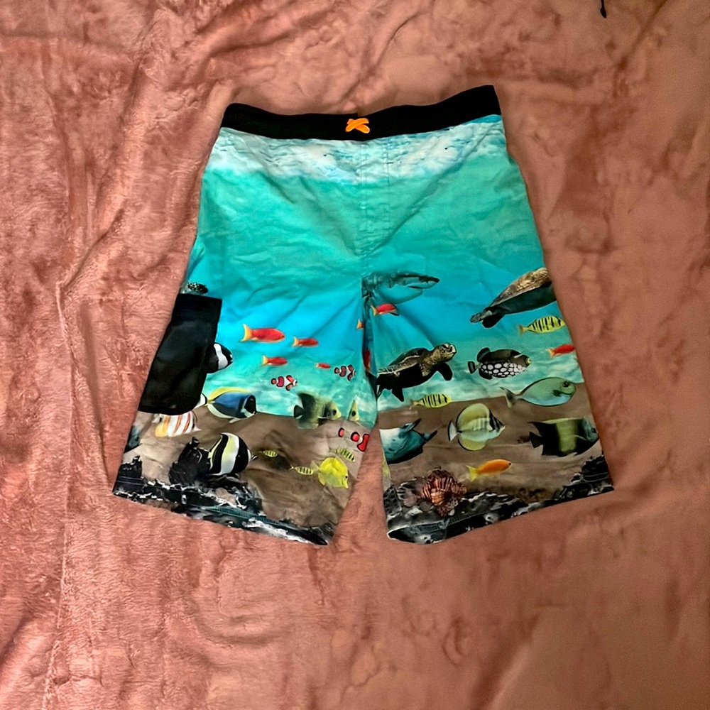 Boys XXL swim shorts with sand pocket for shells